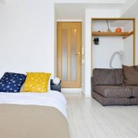 コンフィデンスロン905 Apartment Osaka Bagian luar foto